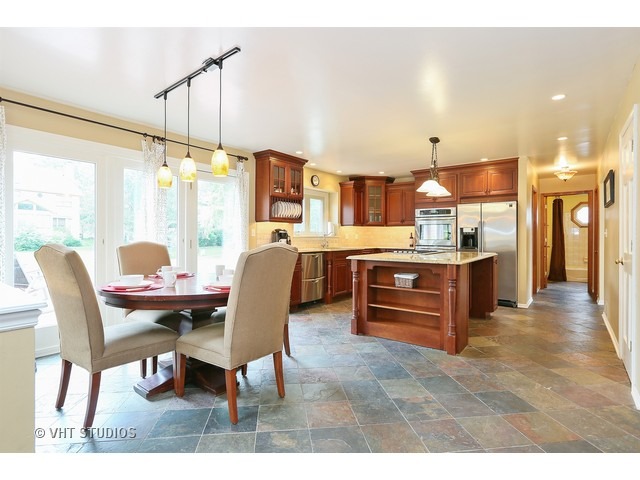 2481 Rio Grande Circle Naperville, IL 60565 - Photo 9 of 25 a dining room with furniture and window