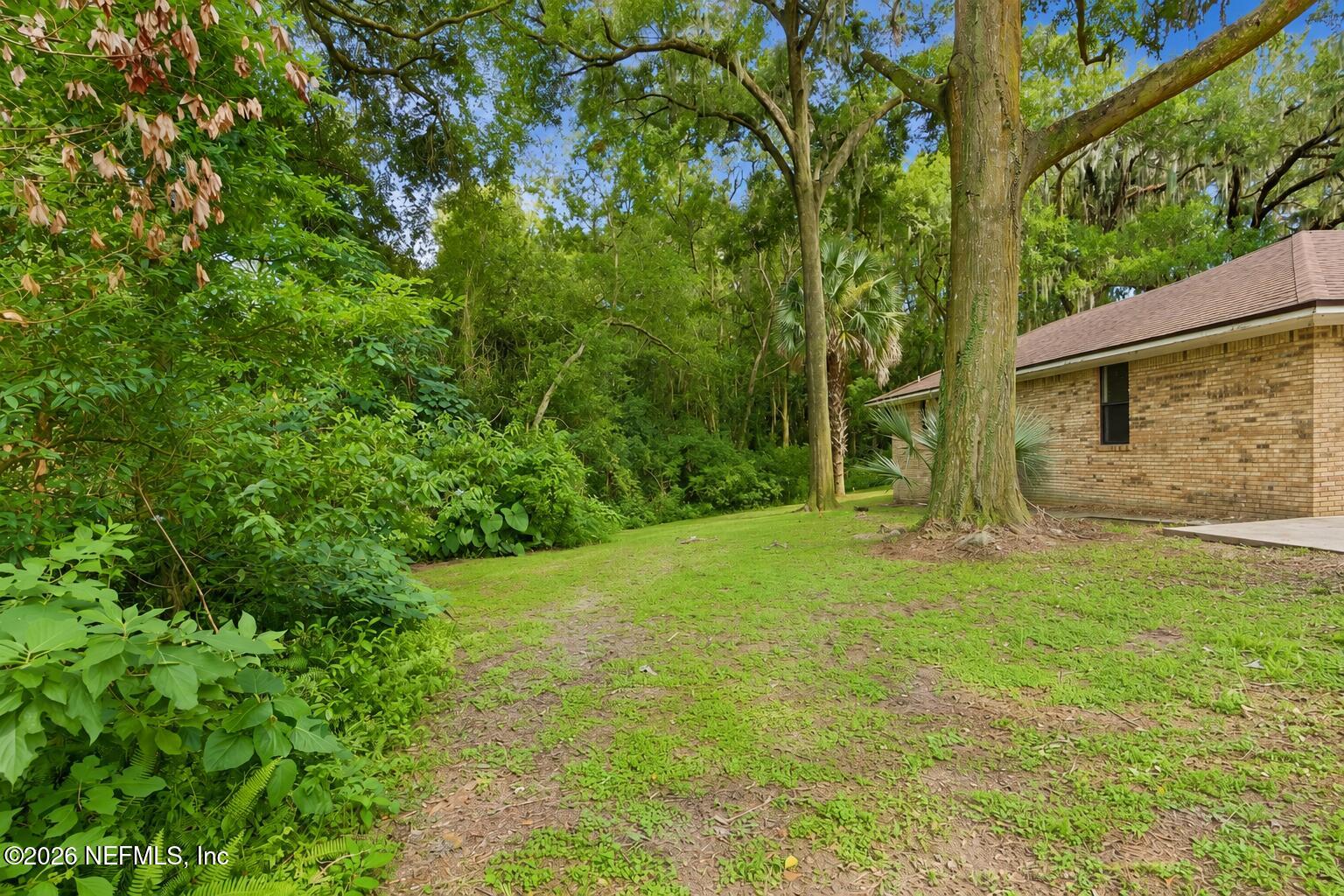 681 Mickler Road Jacksonville, FL 32211 - Photo 29 of 32 LEFT SIDE OF HOME