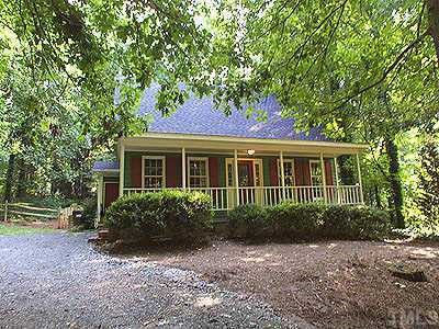 3113 Paxton Place Raleigh, NC 27613 - Photo 1 of 1 a front view of a house with garden