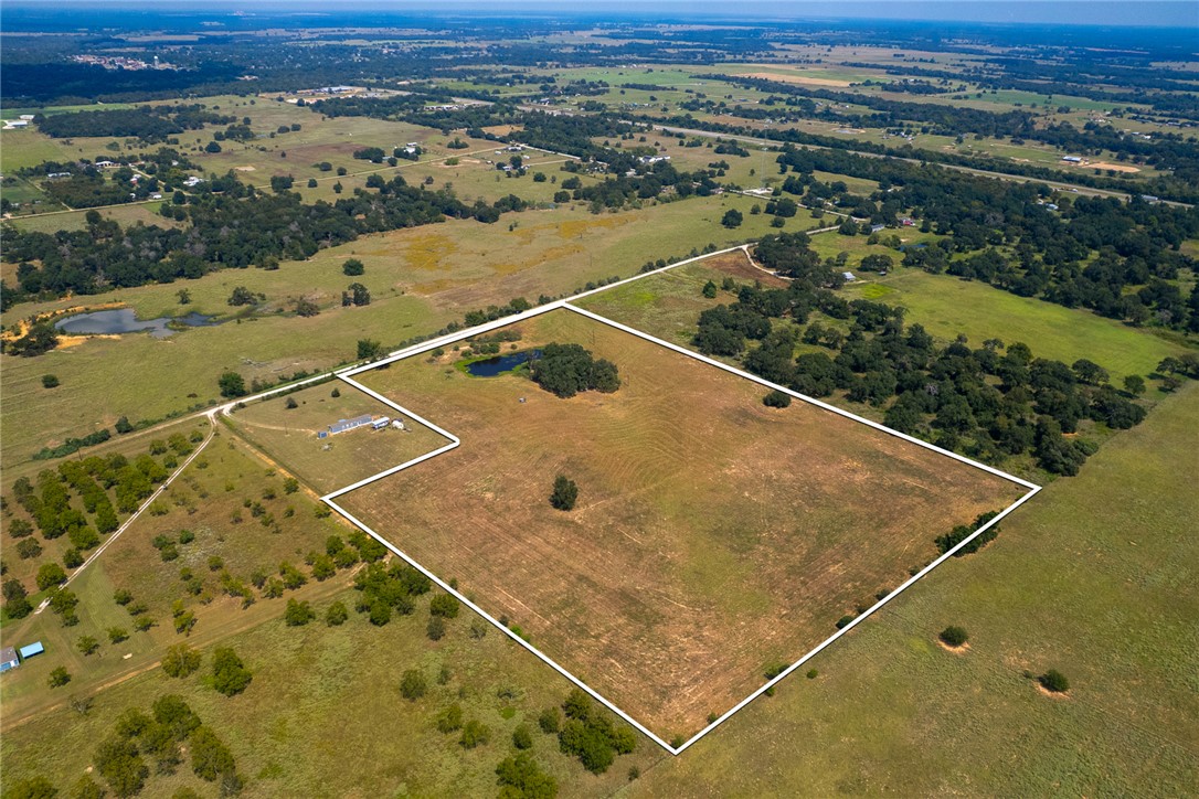 11733 Winstead Lane Calvert, TX 77837 - Photo 14 of 26 Aerial overview of property's location with property parcel outlined and rural landscape