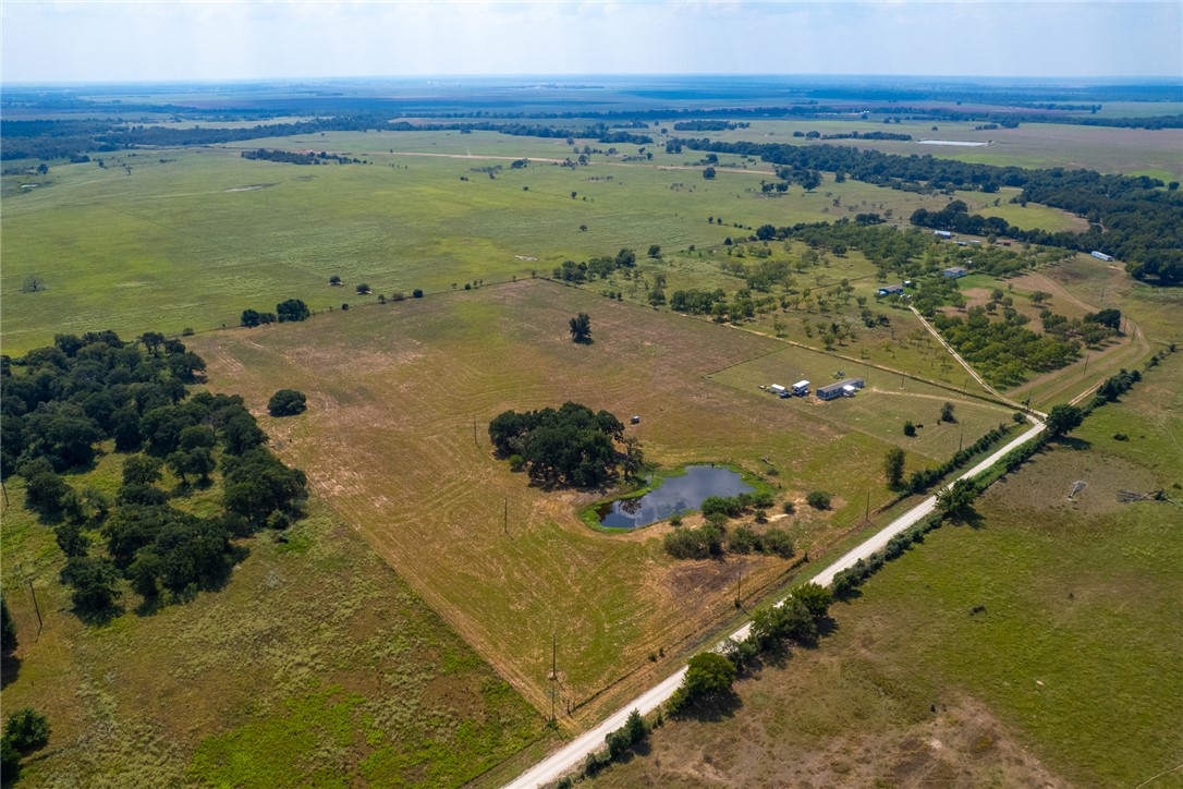 11733 Winstead Lane Calvert, TX 77837 - Photo 3 of 26 Aerial overview of property's location featuring rural landscape and a nearby body of water