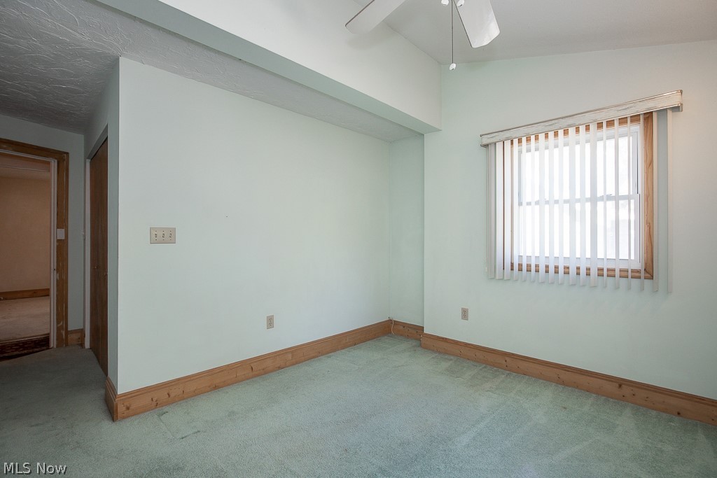 3571 Harvey Road Cleveland, OH 44118 - Photo 17 of 40 Bedroom with vaulted ceiling, carpet, and ceiling fan