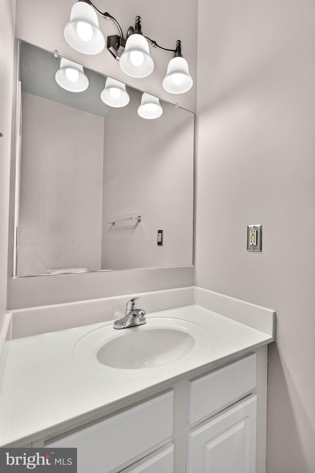 6311 Wind Rider Way Columbia, MD 21045 - Photo 19 of 43 Main Level Powder Room
