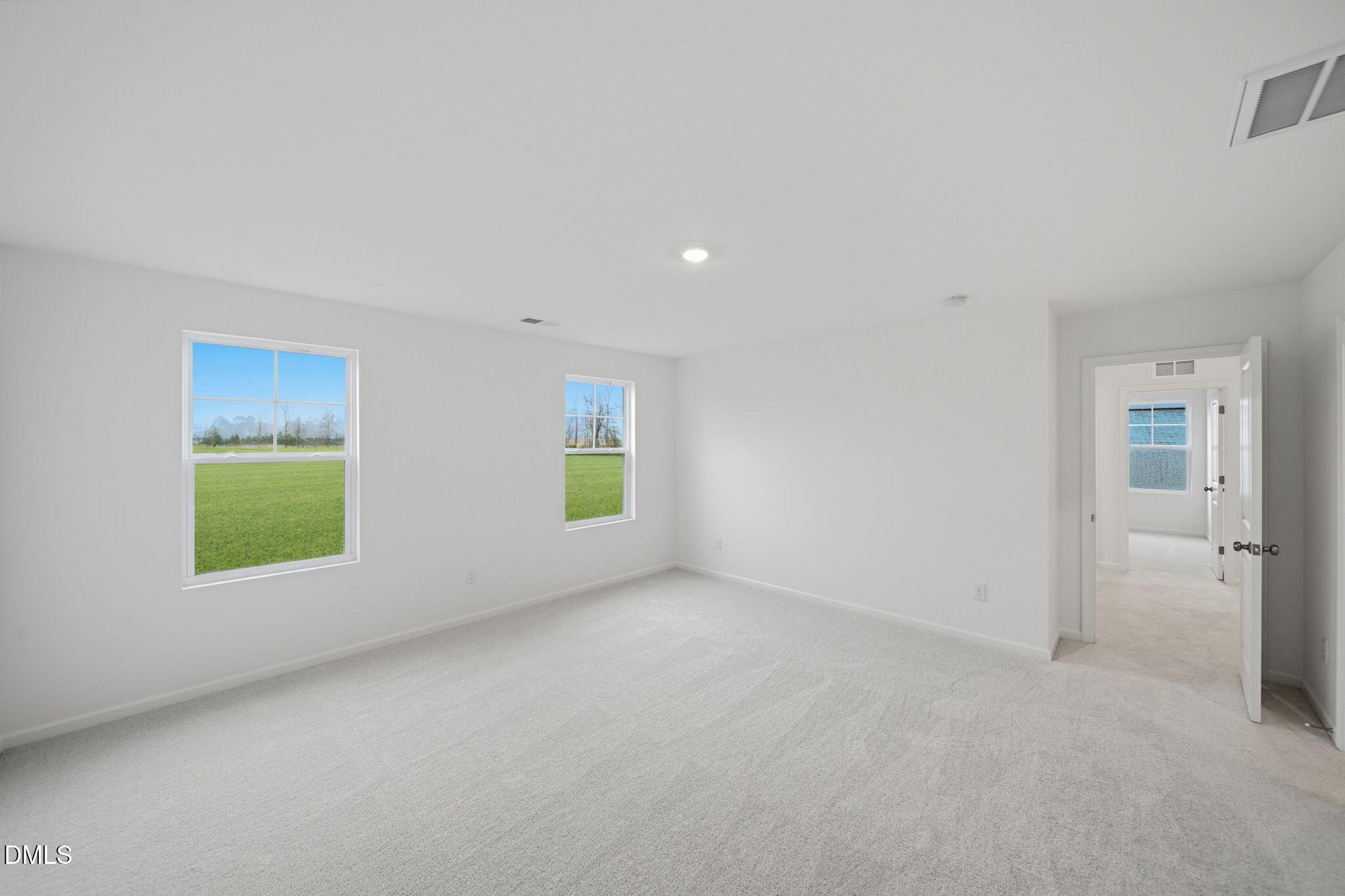 5842 Millstone Way Sims, NC 27880 - Photo 10 of 22 a view of an empty room with a window