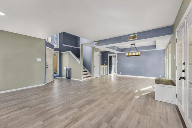 a view of a hallway view with staircase