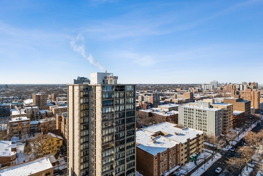 5701 North Sheridan Road, Unit 19B Chicago, IL 60660 - Photo 13 of 17 a city view with tall buildings