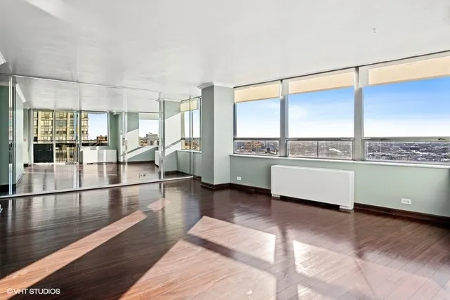 a view of a living room with a large window