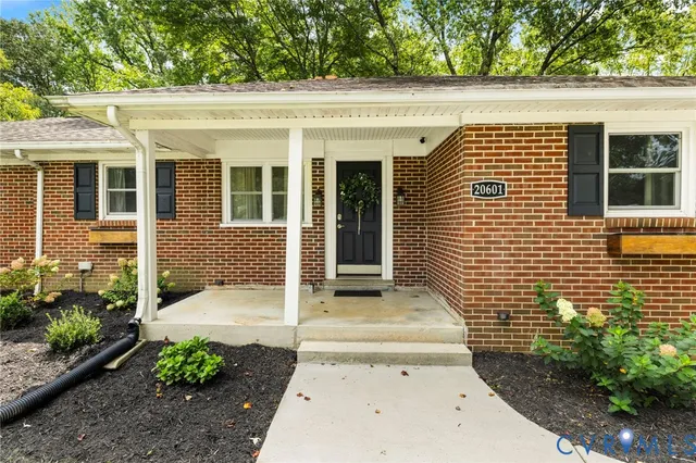 a front view of a house with a porch