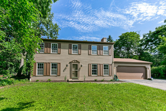 2010 Bilter Road Aurora, IL 60502 - Photo 2 of 47 front view of a house with a yard