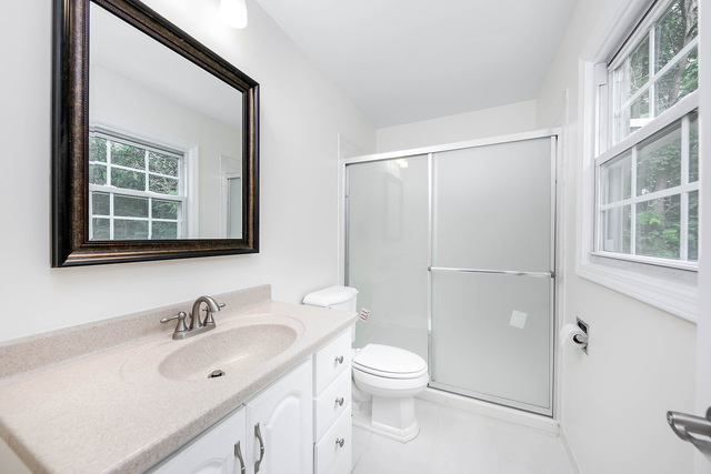2010 Bilter Road Aurora, IL 60502 - Photo 22 of 47 a bathroom with a sink and a toilet
