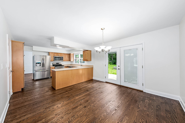 2010 Bilter Road Aurora, IL 60502 - Photo 6 of 47 a view of kitchen with wooden floor
