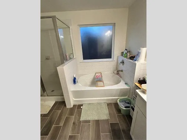 a bathroom with a sink and mirror