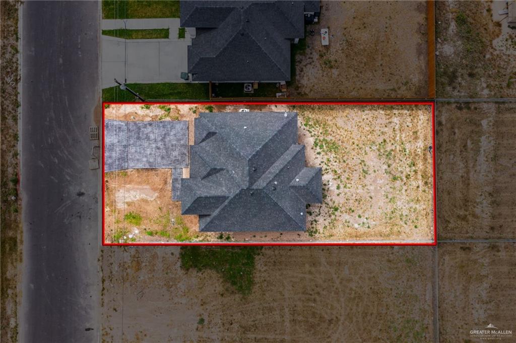 348 Coro Street Donna, TX 78537 - Photo 15 of 17 an aerial view of a residential house with a yard