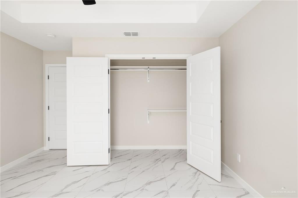 348 Coro Street Donna, TX 78537 - Photo 10 of 17 a view of a room with a hallway