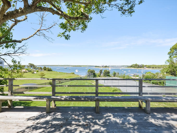 276 Scraggy Neck Road Cataumet, MA 02559 - Photo 8 of 20 a view of a swimming pool with a lake view