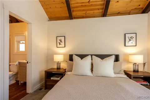 a utility room with sink dryer and washer