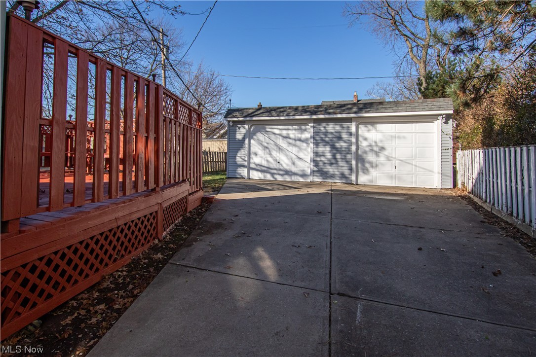 4764 Rockwood Road Cleveland, OH 44125 - Photo 28 of 35 View of patio featuring a garage