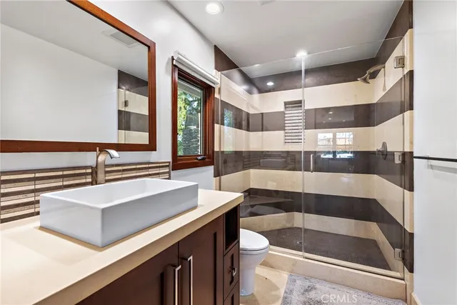 a view of living room with granite countertop furniture and a sink