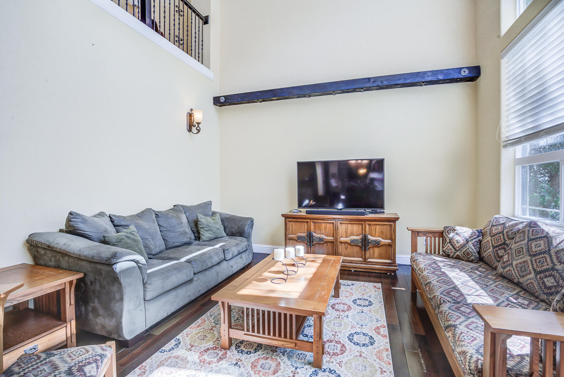 5146 Surrey Drive Redding, CA 96002 - Photo 26 of 57 a living room with furniture and a flat screen tv