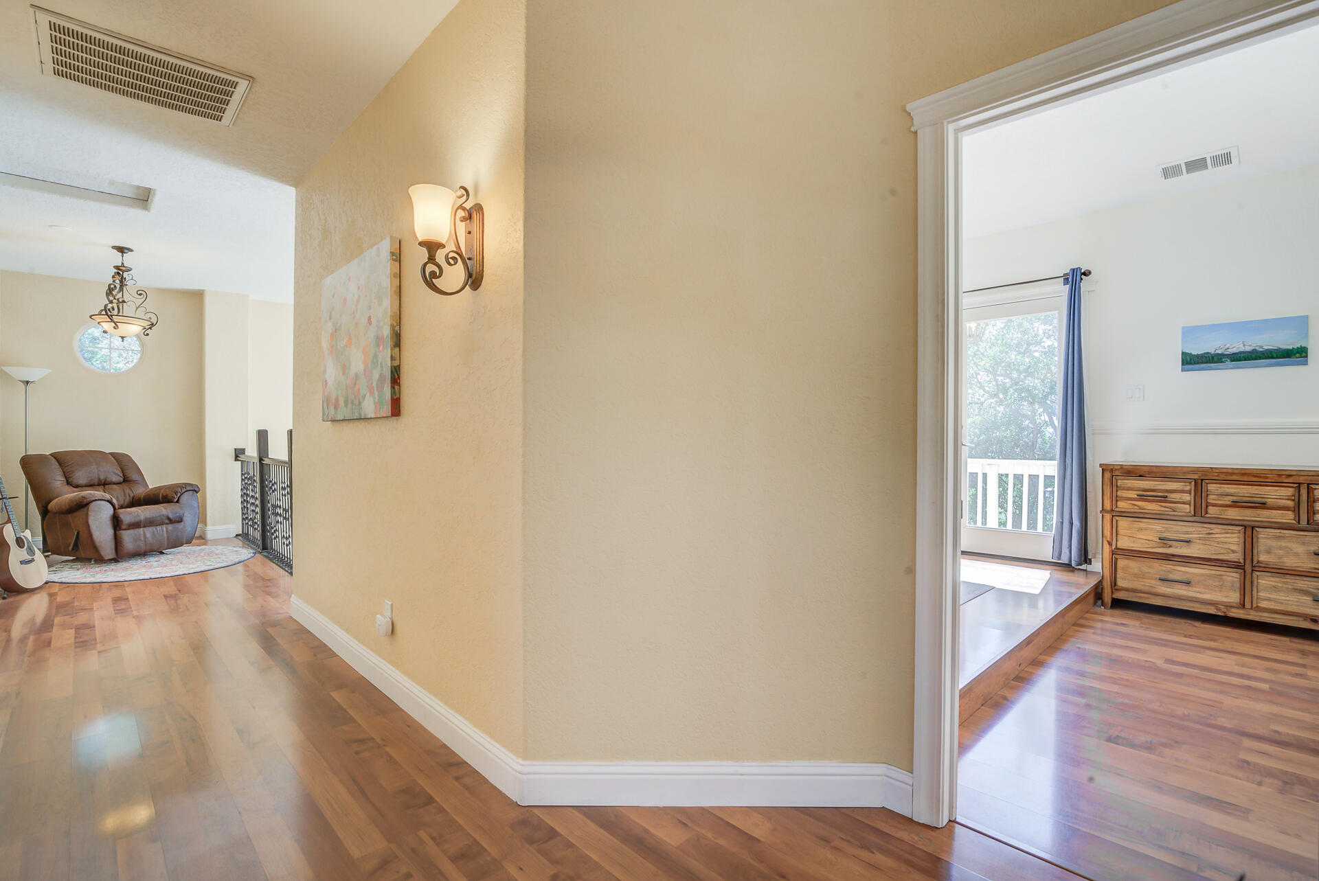 5146 Surrey Drive Redding, CA 96002 - Photo 27 of 57 a view of a bedroom with wooden floor