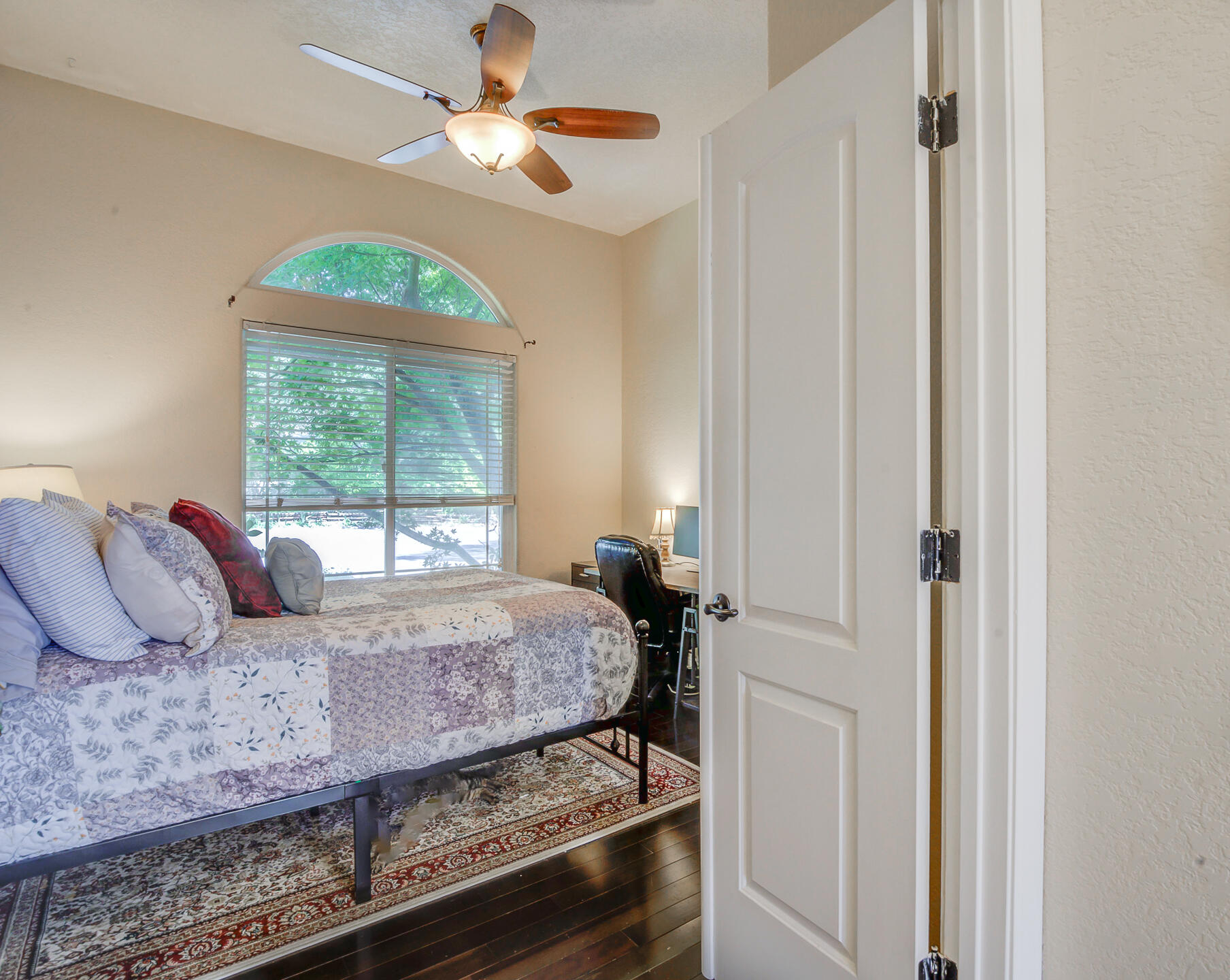 5146 Surrey Drive Redding, CA 96002 - Photo 6 of 57 a bedroom with a bed and a window