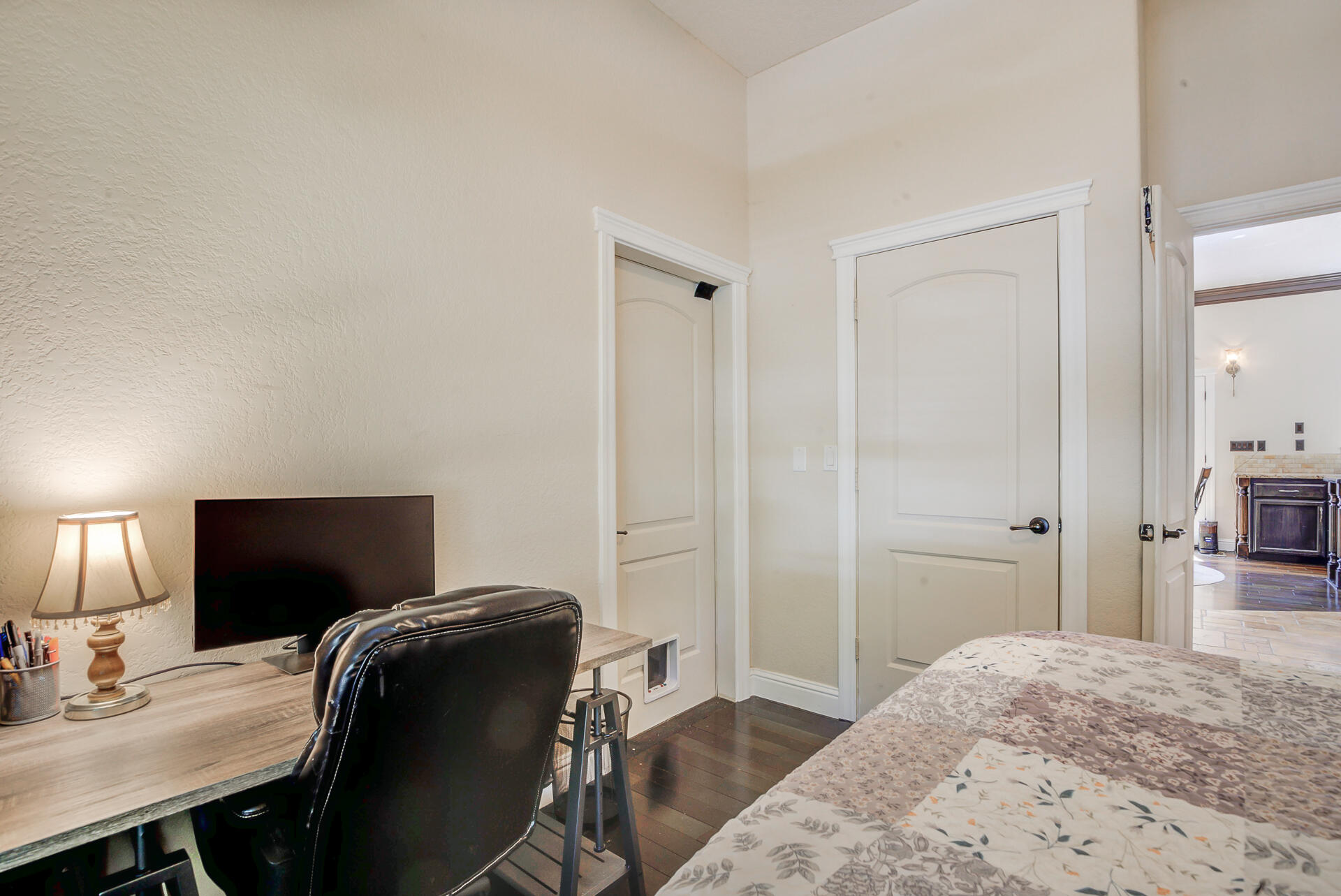 5146 Surrey Drive Redding, CA 96002 - Photo 8 of 57 a bedroom with a bed and a flat screen tv