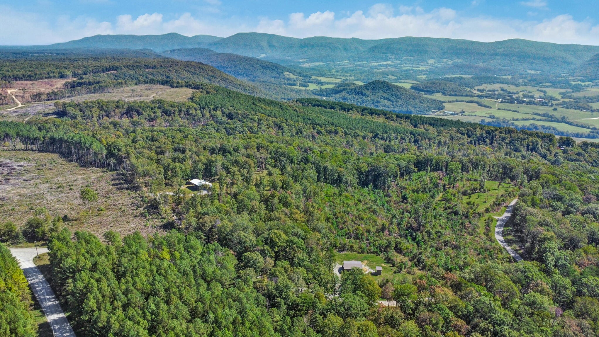 0 Overview Road Crossville, TN 38572 - Photo 8 of 18 an aerial view of residential houses with outdoor space and trees