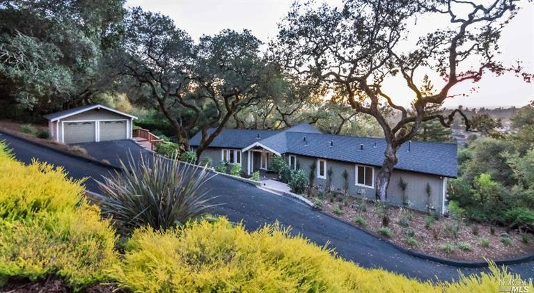 3465 Ridgeview Drive Santa Rosa, CA 95404 - Photo 1 of 1 a front view of a house with a yard