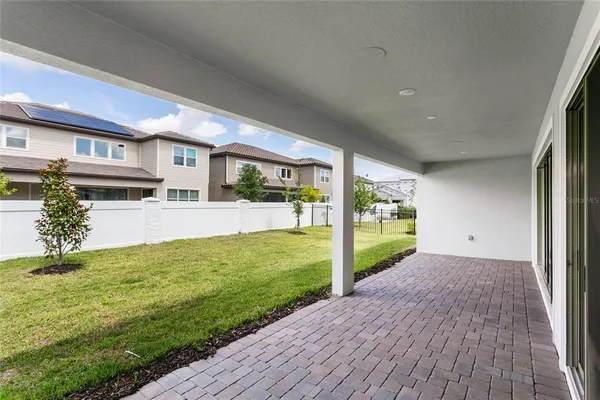 a view of a kitchen with a sink and a window
