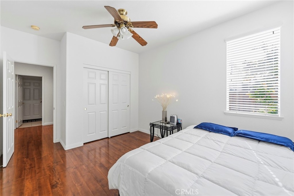 1663 Naranjo Court Redlands, CA 92374 - Photo 22 of 59 a bedroom with a bed and a window