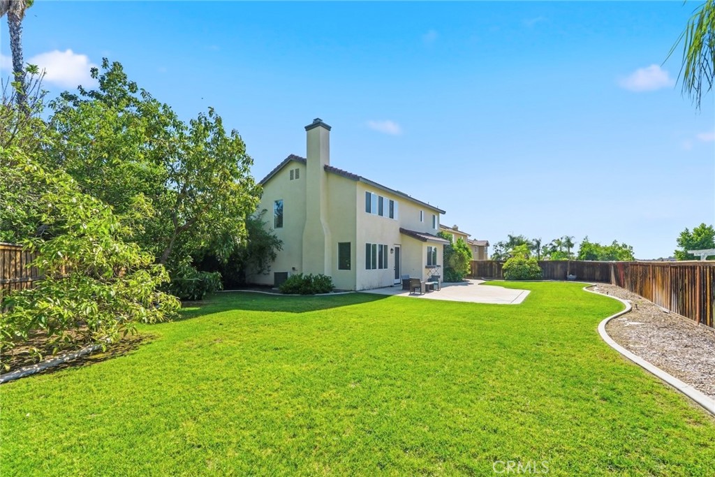 1663 Naranjo Court Redlands, CA 92374 - Photo 46 of 59 a front view of a house with garden