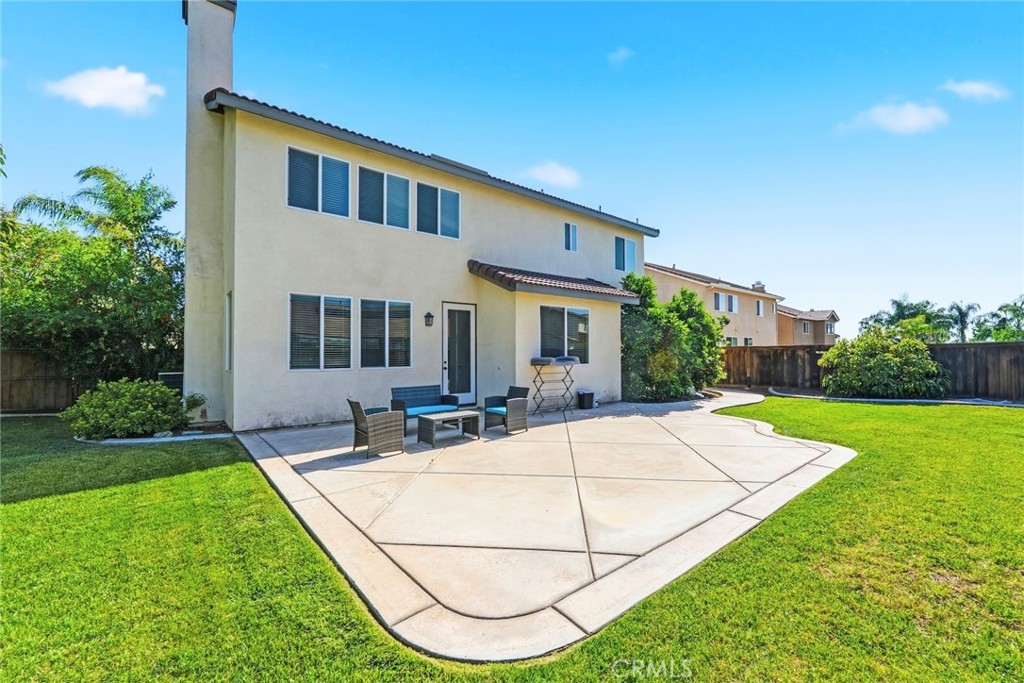 1663 Naranjo Court Redlands, CA 92374 - Photo 49 of 59 a view of a house with a yard porch and sitting area