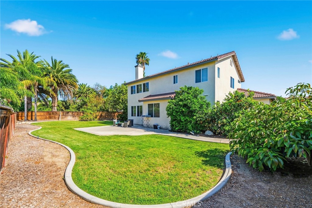 1663 Naranjo Court Redlands, CA 92374 - Photo 50 of 59 a view of a house with a backyard porch and sitting area