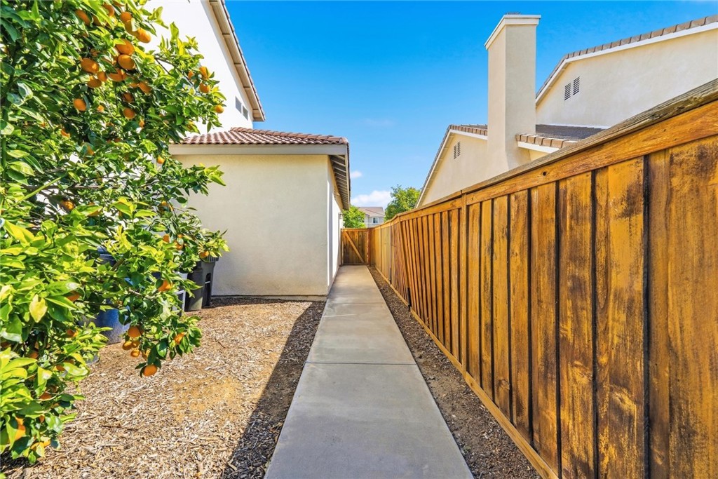 1663 Naranjo Court Redlands, CA 92374 - Photo 51 of 59 a view of a pathway of a house with wooden floor