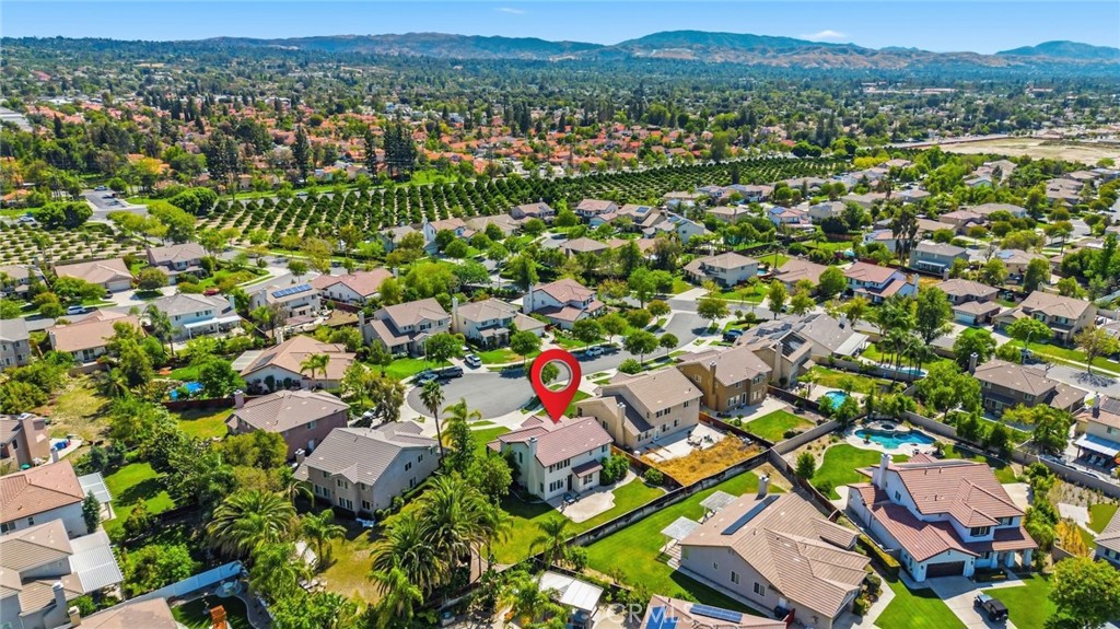 1663 Naranjo Court Redlands, CA 92374 - Photo 56 of 59 an aerial view of residential houses with outdoor space and street view