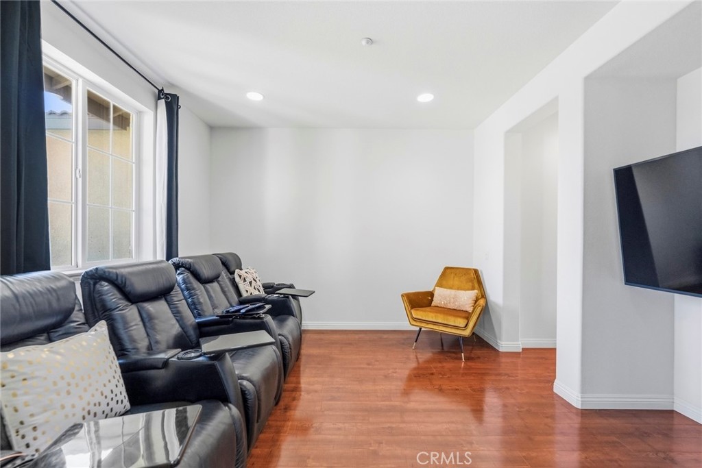 1663 Naranjo Court Redlands, CA 92374 - Photo 7 of 59 a living room with furniture and a flat screen tv