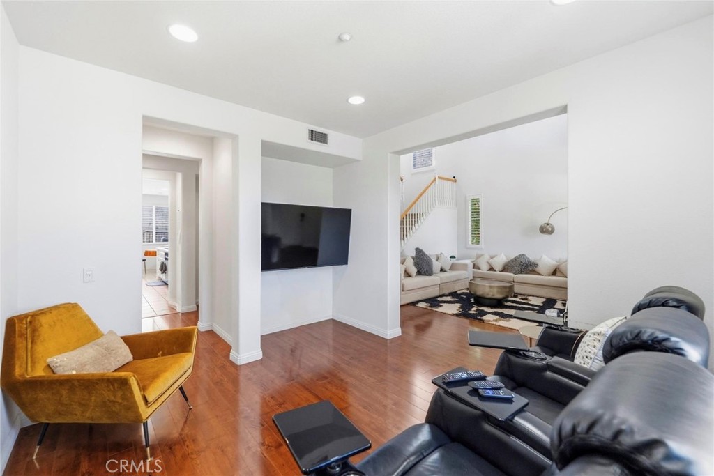 1663 Naranjo Court Redlands, CA 92374 - Photo 8 of 59 a living room with furniture and a flat screen tv