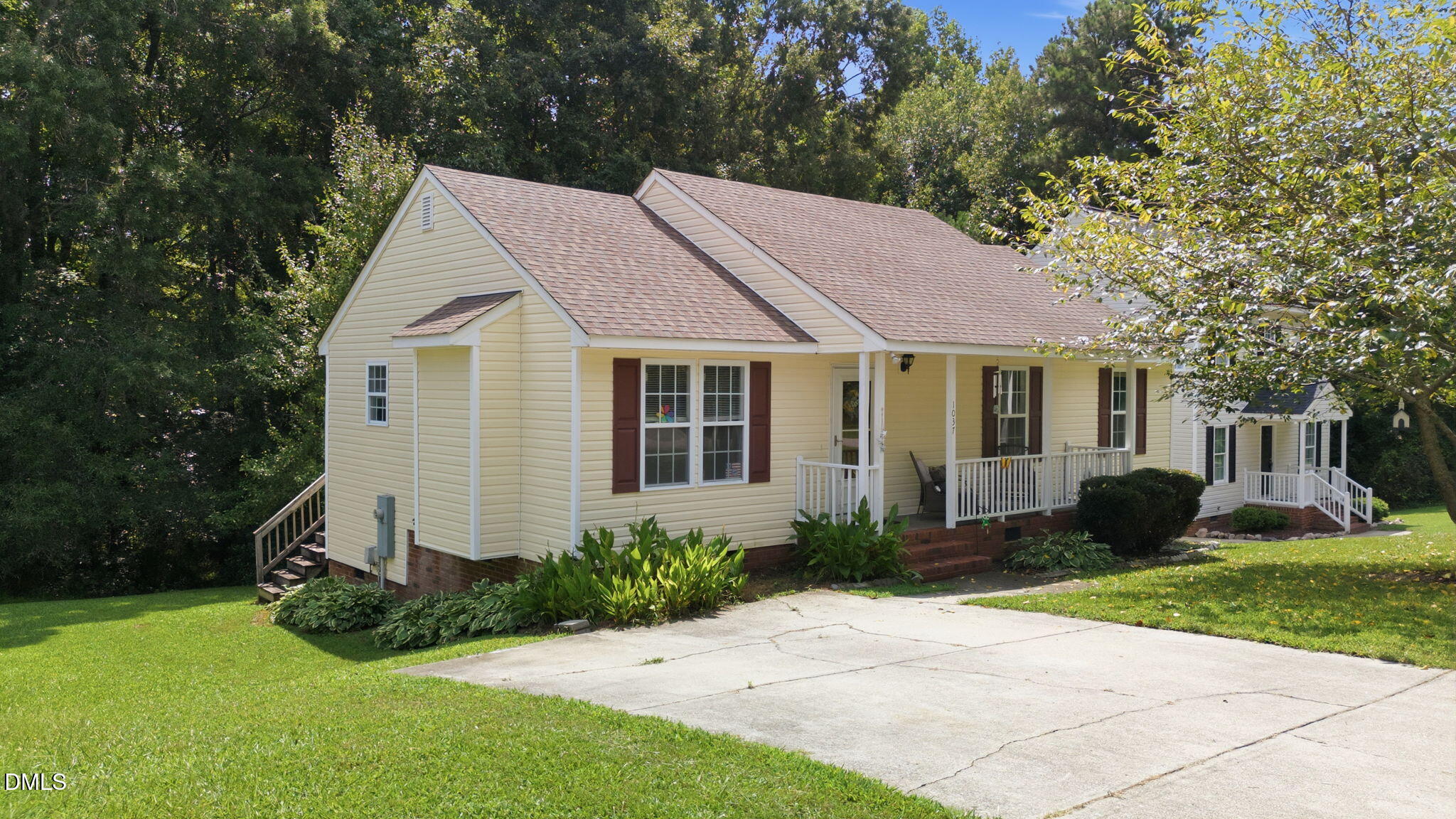 1037 Laurel Leaf Road Zebulon, NC 27597 - Photo 1 of 20 6-web-or-mls-DJI_20260826121734_0947_D