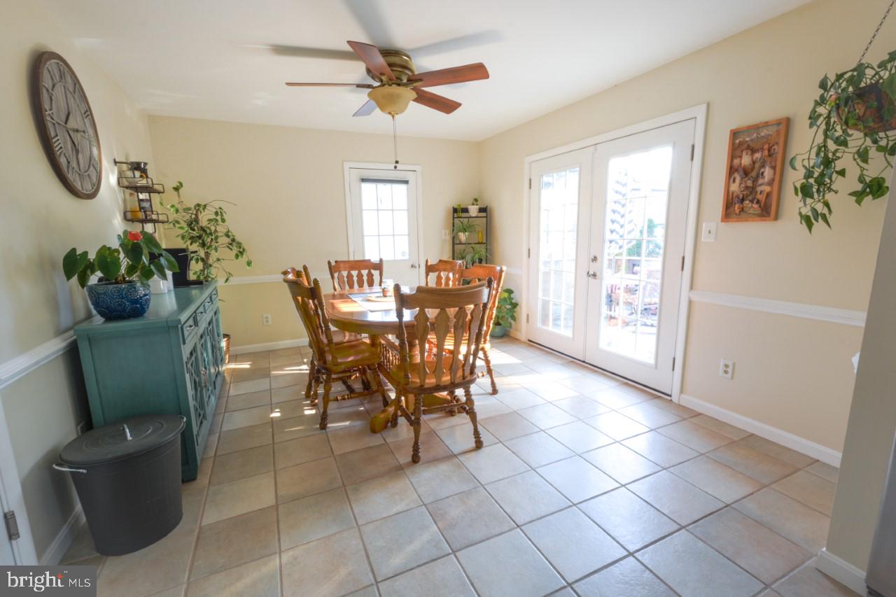 237 Garnett Road Joppa, MD 21085 - Photo 12 of 22 Eat in area of kitchen leading to deck