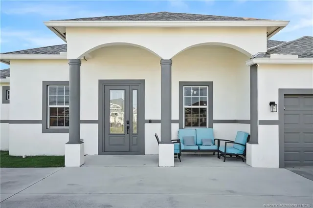 a view of house with a outdoor space and porch