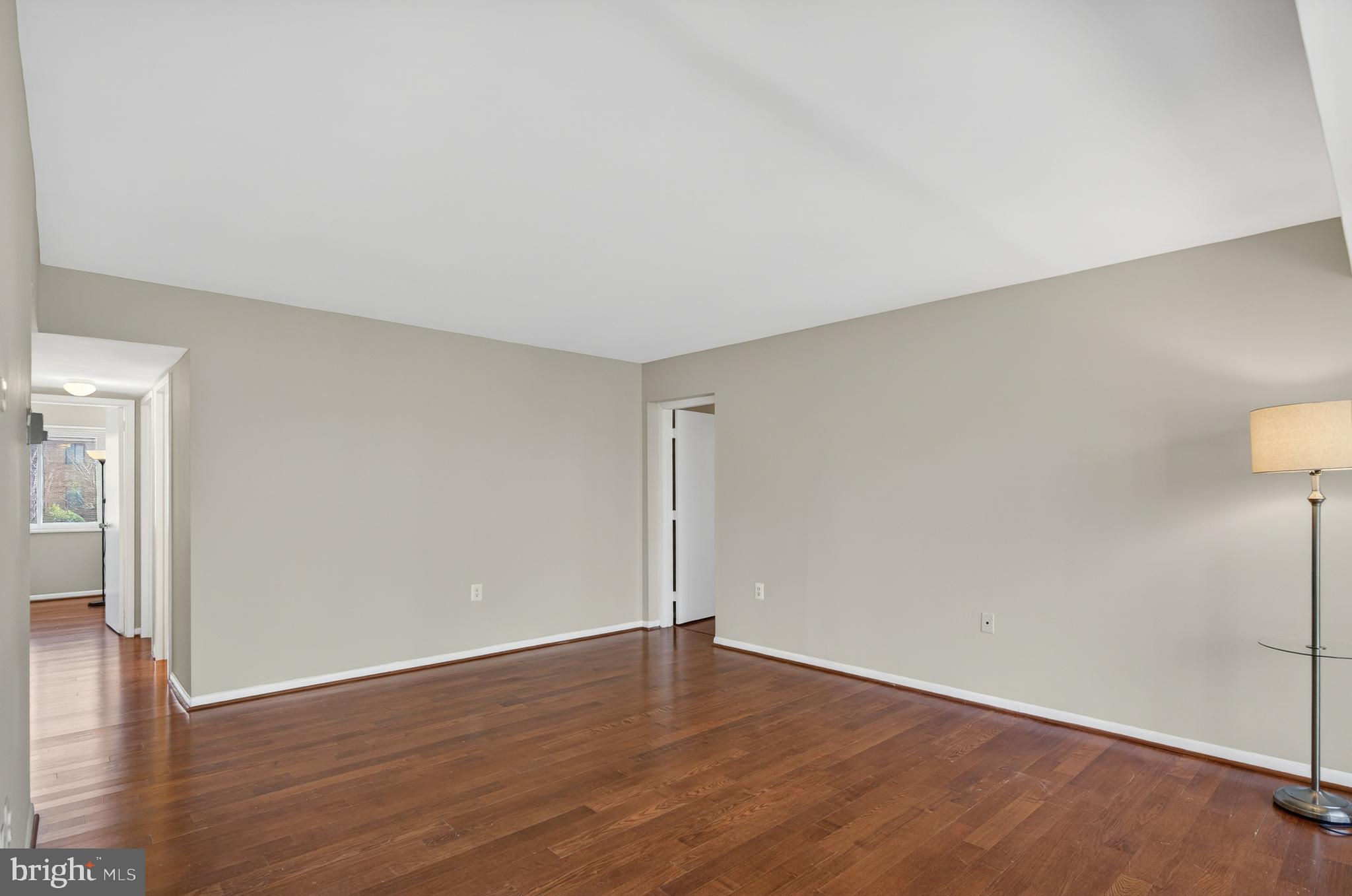 1526 Northgate Square, Unit 11 Reston, VA 20190 - Photo 6 of 26 Large Airy Living RoomLarge Primary Suite