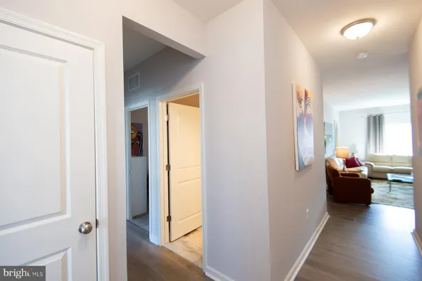 a living room with furniture and a gate
