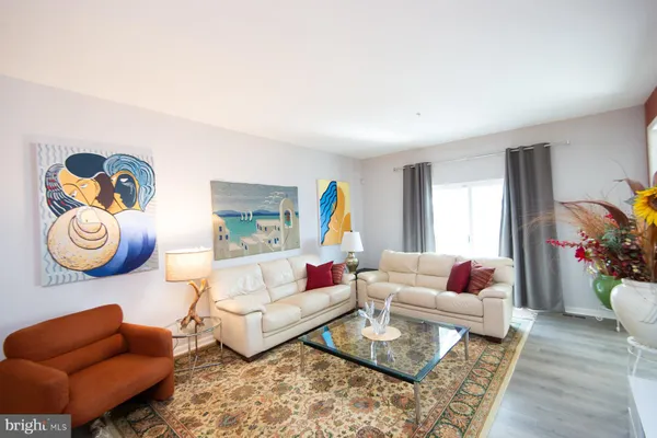 a living room with furniture and a couch