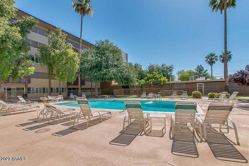349 East Thomas Road, Unit E103 Phoenix, AZ 85012 - Photo 14 of 24 Pool just steps away from unit E-103