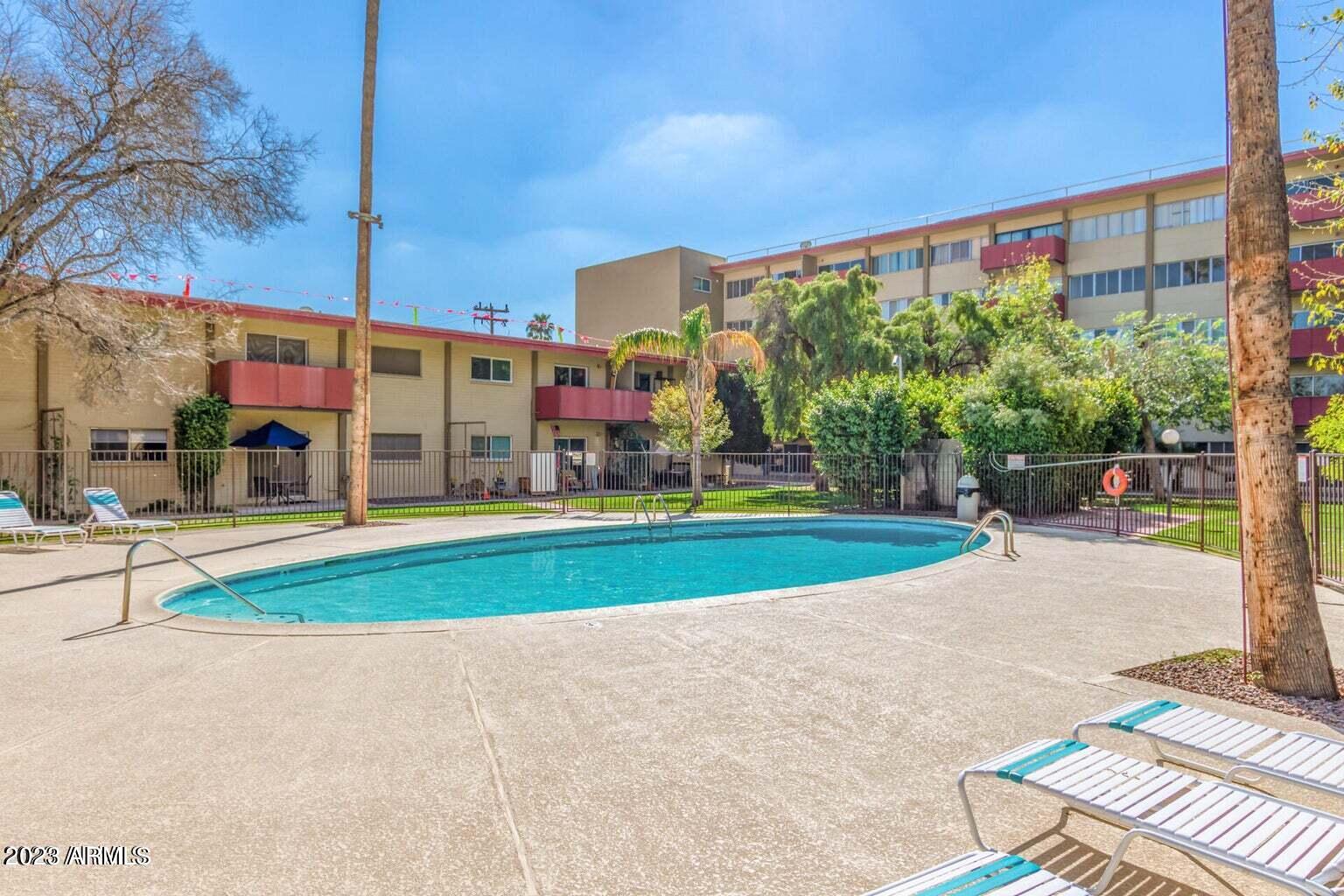 349 East Thomas Road, Unit E103 Phoenix, AZ 85012 - Photo 16 of 24 one of the community pools