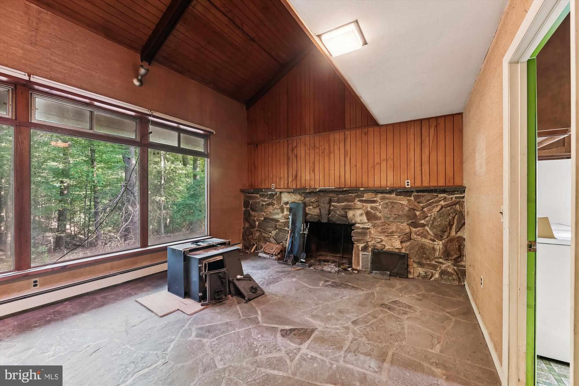 15120 Reserve Road Accokeek, MD 20607 - Photo 9 of 32 a living room with furniture and a fireplace