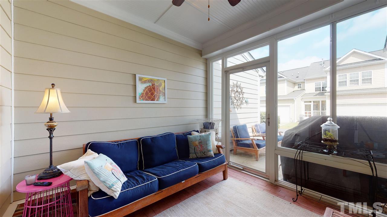 628 Democracy Street Raleigh, NC 27603 - Photo 13 of 26 a living room with furniture and a window