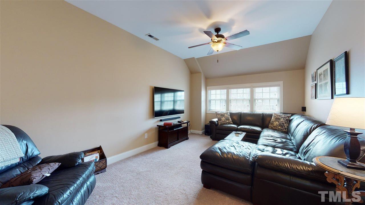 628 Democracy Street Raleigh, NC 27603 - Photo 15 of 26 a living room with furniture