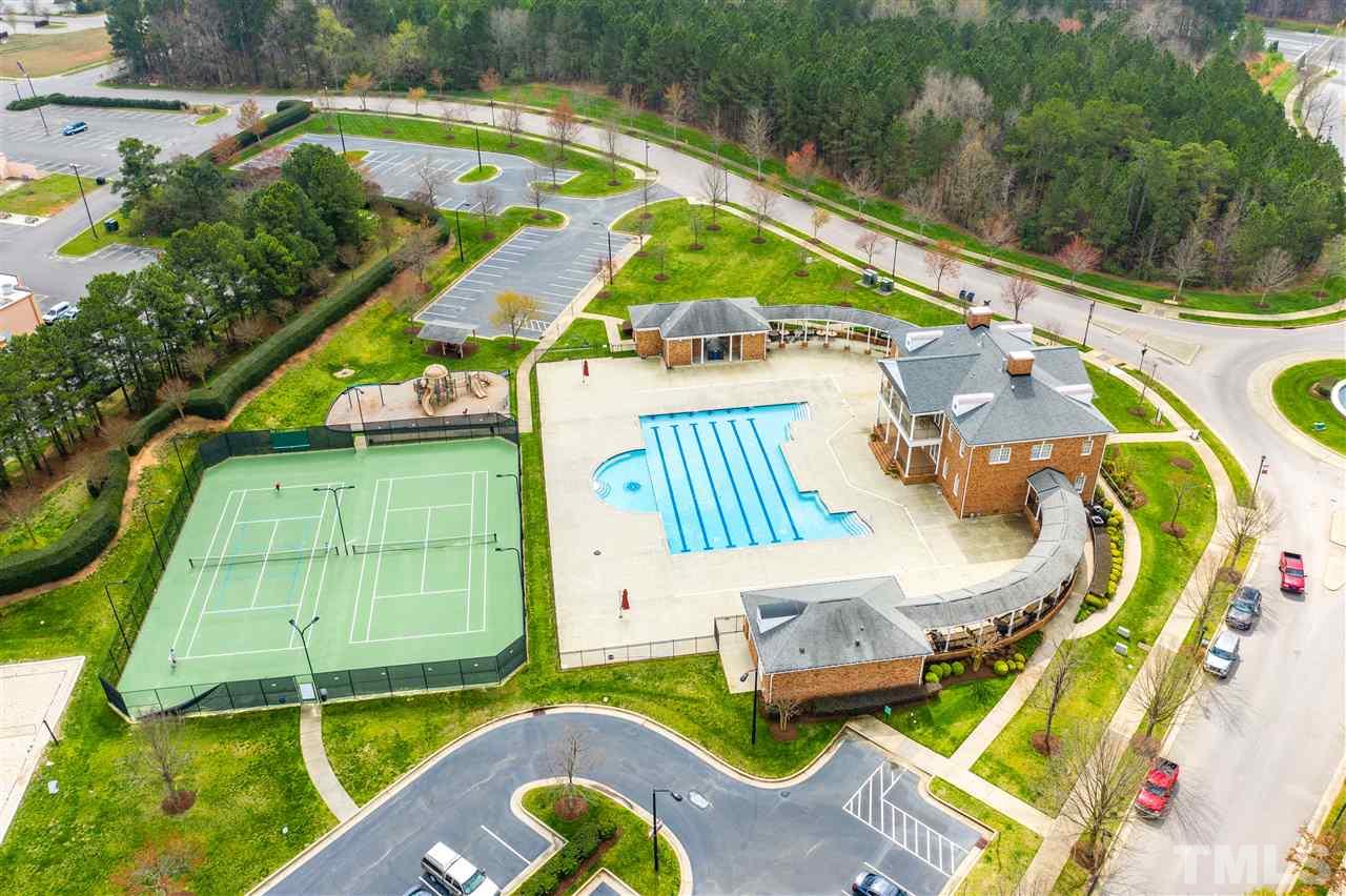 628 Democracy Street Raleigh, NC 27603 - Photo 25 of 26 an aerial view of a house with a swimming pool