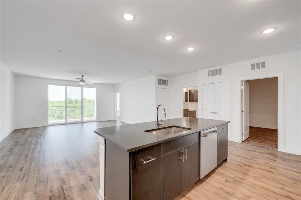 4801 Springdale Road, Unit 1307 Austin, TX 78723 - Photo 2 of 30 a kitchen with a sink and large window